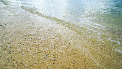 Fototapeta na wymiar A sea of clear water with calm waves