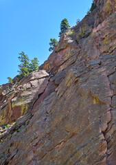 Rock Climbers Resting Midway Through Their Ascent