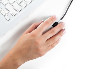 Closeup of Woman's Hand Using a Mouse