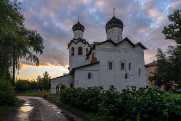 Fototapeta na wymiar View of the Spaso-Preobrazhensky Monastery on an early cloudy summer morning, Staraya Russa, Novgorod region, Russia. The inscription on the church: 