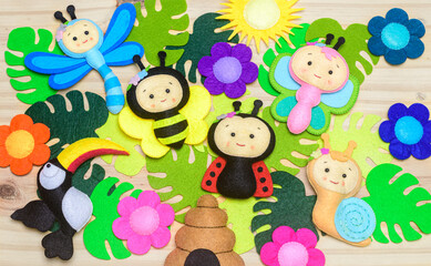 Colorful handmade felt toys collection for playful little kid. Concept of early childhood development.