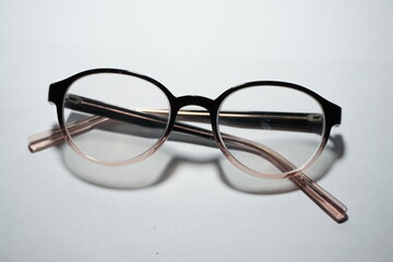a pair of glasses on a white background