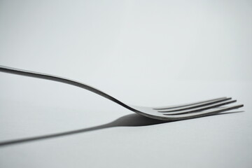 a fork on a white background