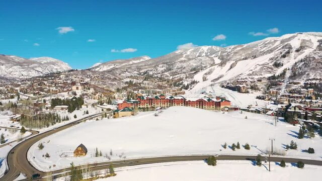 Aerial View Of Steamboat Grand Resort Hotel With Snowy Foreground In Mount Werner Circle, Steamboat Springs, Colorado On A Sunny Winter Day.