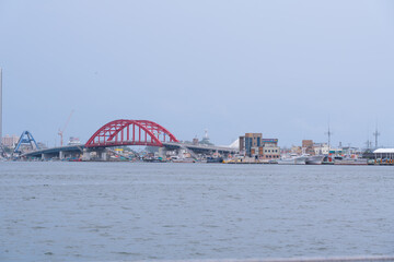 Fototapeta premium Bridge Over Calm River Against Clear Sky