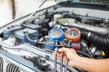 Obraz premium Car air conditioner check service, leak detection, fill refrigerant.