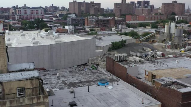 Upward tilting pan over Brooklyn New York's Bushwick neighborhood
