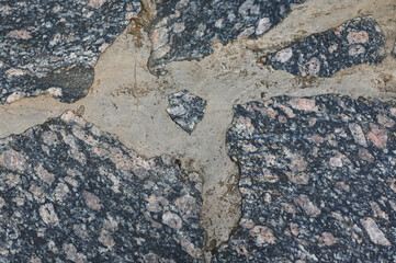Old dirty wall close up. Grunge abstract photo background.  Beautiful stone texture pattern.
