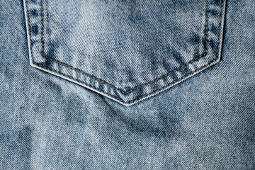 Texture of blue jeans, top view