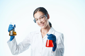 female laboratory assistant chemical solution research science analyzes