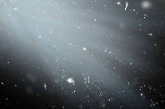 Dust Particles And Scratches On A Black Background For Use With The Screen Overlay Mode