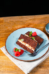 Rustic chocolate cake with raspberries and coffee