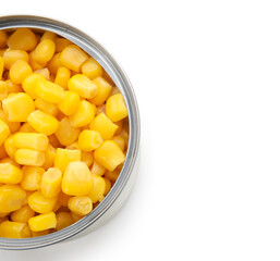 Opened tin can of corn kernels on white background