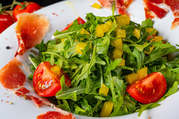 Rocket salad with dried Spanish ham
