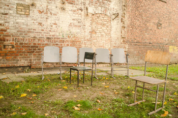 Some chairs were taken outside the school.