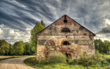 Fototapeta premium Abandoned historic building in Kazupe, Latvia.