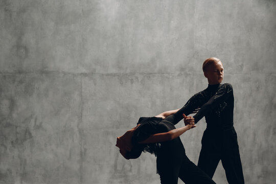 Young couple dancing ballroom dance Paso doble.
