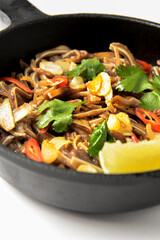 Fried pig ears with sesame seeds and green onions close-up. Fried pig ears in korean style.