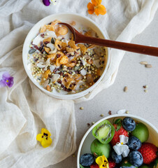 Homemade delicious snack. Granola Bowl & fruit Bowl. Healthy boost of natural multi vitamins, minerals and dietary fiber.