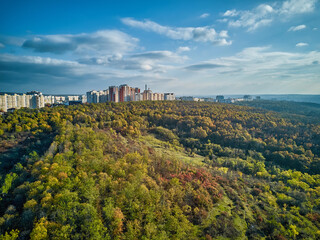Fototapeta na wymiar Aerial view of the city at sunset. Beautiful autumn city landscape. Kishinev, Moldova republic of.