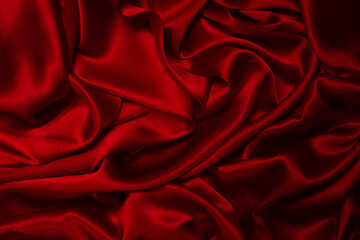 Rich and luxury red silk fabric texture background.