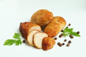 Concept of tasty food with cutlets on white background