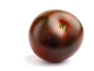 Ripe tomato cherri cumato close-up isolated on a white background. Black tomato.