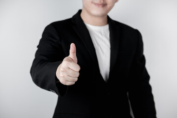 ฺBusinessman showing thumbs up or good job symbol.