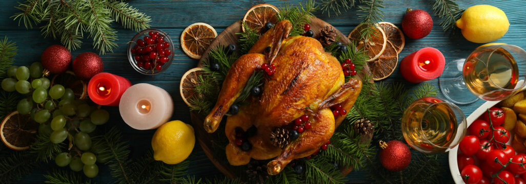 Concept of Christmas roast turkey on wooden table