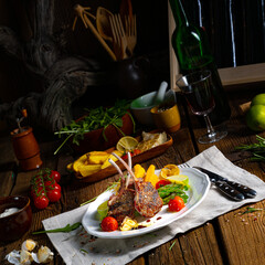 Lamb chops marinated in herbs with green asparagus and lime