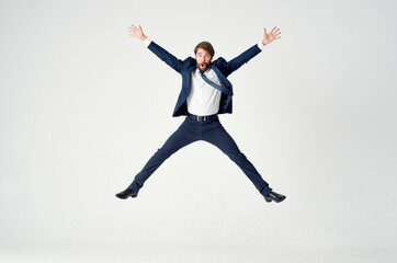 Fototapeta na wymiar business man in suit emotions jump joy