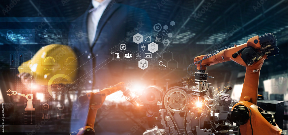 Aufkleber Industry 4.0. Smart industry robot arms control and operation on software by Engineer welding robotics in factory automotive industrial. Industry network connection icon. AI, Artificial Intelligence. 