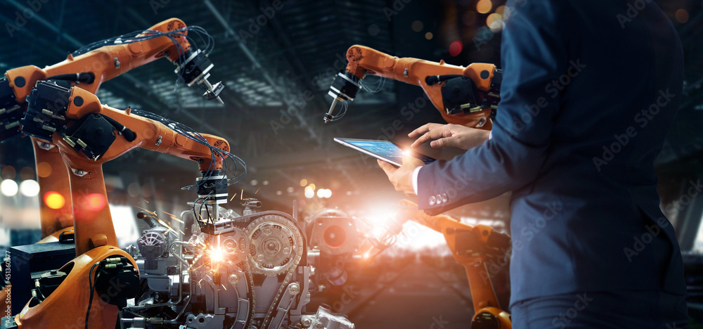 Poster Manager engineer check and control automation robot arms machine in intelligent factory industrial on real time monitoring system software. Welding robotics and digital manufacturing operation.