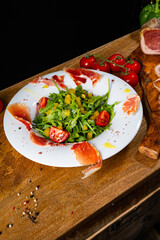 Rocket salad with dried Spanish ham