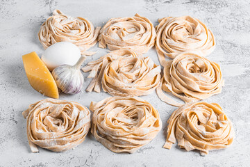cooking pasta machine work fresh and raw on white background
