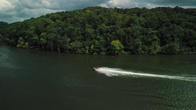 Aerial photography is an epic shot of jet ski racing on a large river. High quality 4k footage