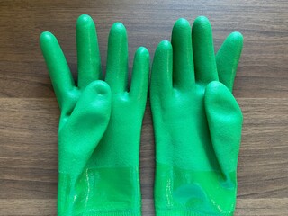 green rubber gloves