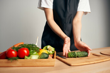 fresh vegetables slicing in the kitchen cooking