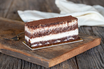 tiramisu dessert on wood background