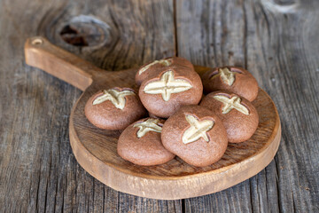 tahini cookies on a wooden background.