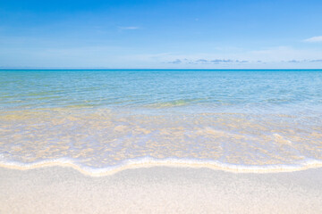 Fototapeta na wymiar sand beach and blue sky
