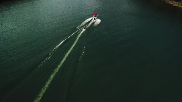 Aerial photography is an epic shot of jet ski racing on a large river. High quality 4k footage