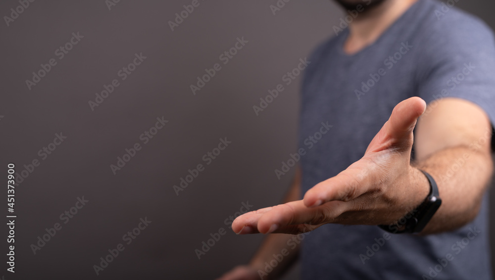 Poster man showing his empty hand.