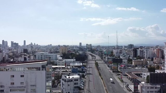 santo domingo, dominican republic - 10 march 2020 - drone area view flying from right to left showing the empty streets of 27 de febrero avenue, stay at home, covid19 time