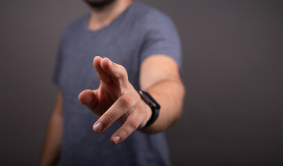 Businessman pointing or touching finger in screen..