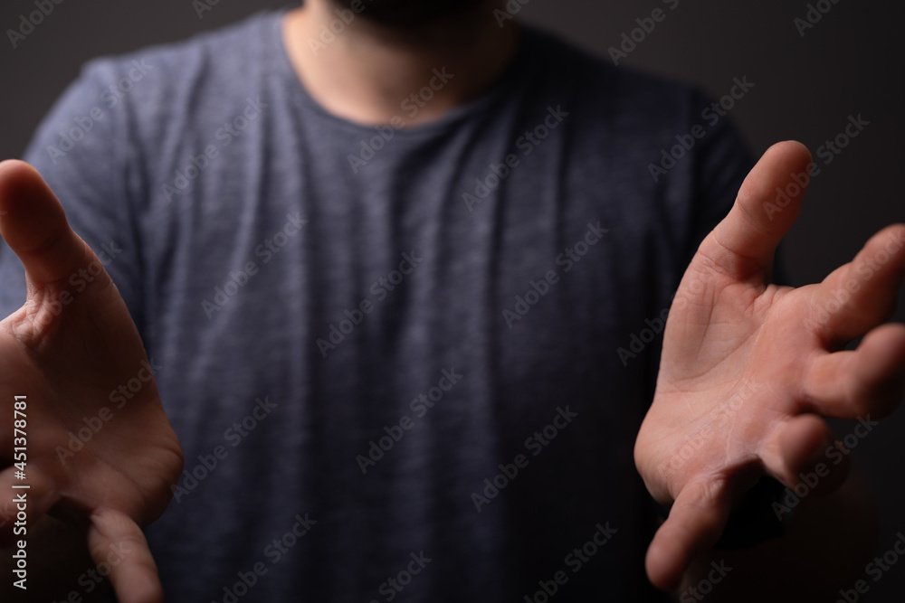 Poster man showing his empty hand.