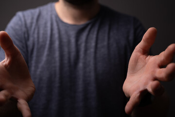 man showing his empty hand.