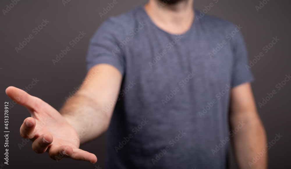Poster man showing his empty hand.