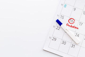 Ovulation day mark in calendar with ovulation home test