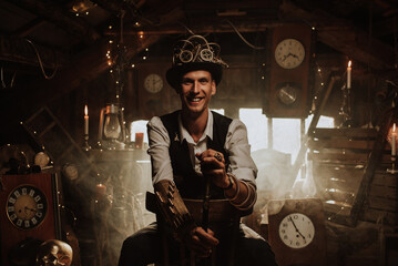 male inventor in a steampunk suit with a hat, glasses and a cane smiles
